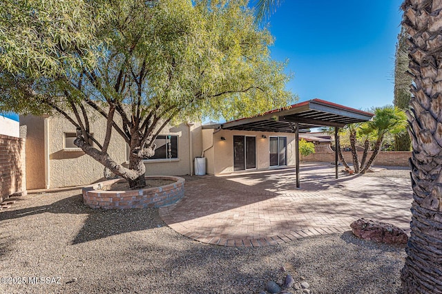 rear view of house with a patio area