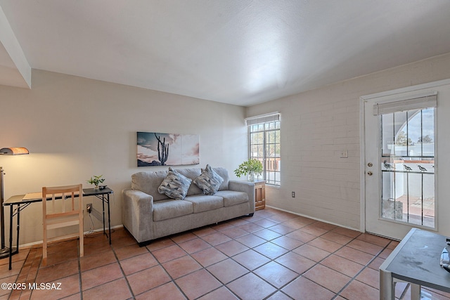 living room with tile patterned floors