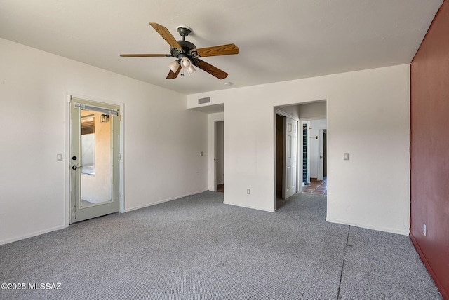 carpeted empty room with ceiling fan