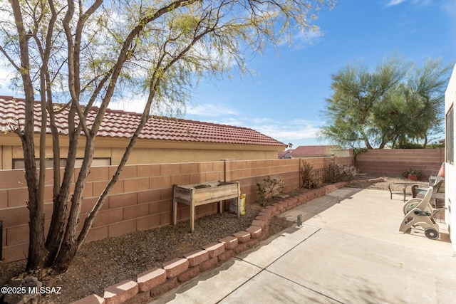 view of patio featuring a fenced backyard