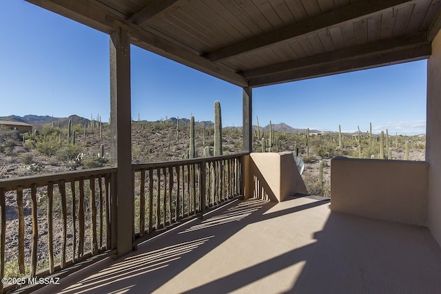 balcony featuring a mountain view