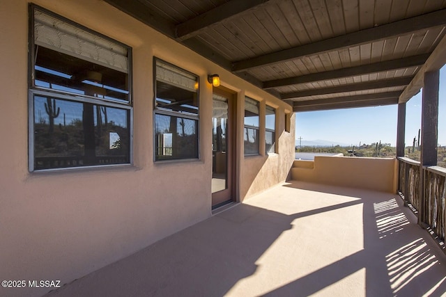 view of patio with a balcony