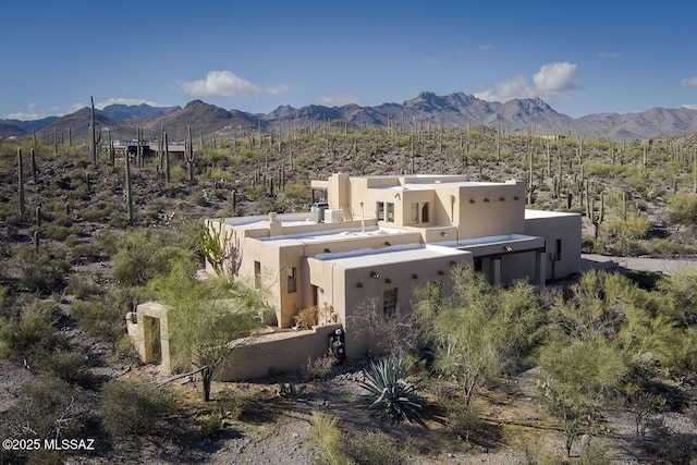 exterior space featuring a mountain view