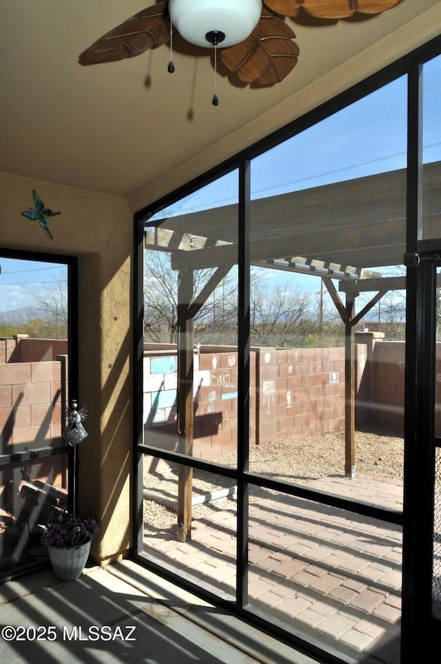 unfurnished sunroom with a healthy amount of sunlight