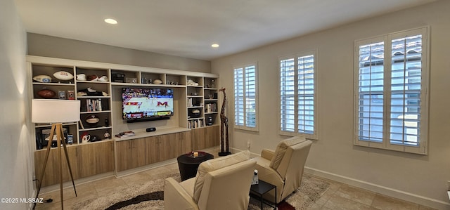 home theater with a wealth of natural light