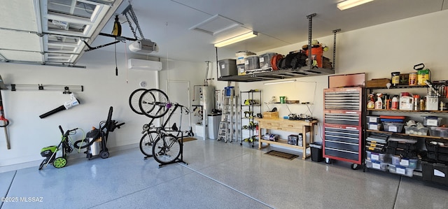 garage with a garage door opener and gas water heater