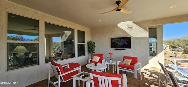 view of patio with ceiling fan