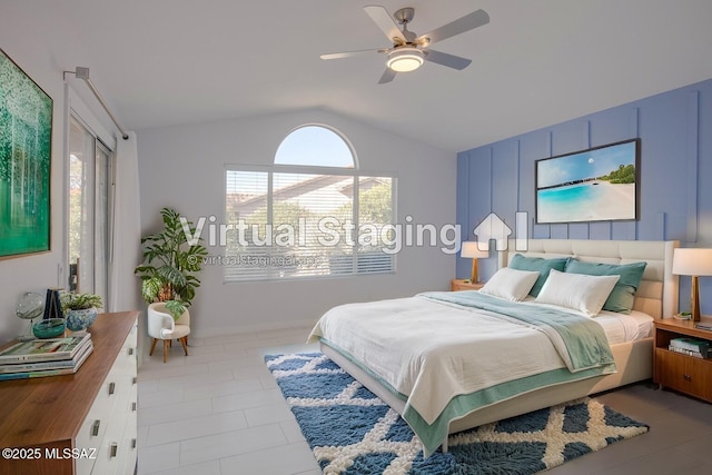 tiled bedroom featuring vaulted ceiling and a ceiling fan