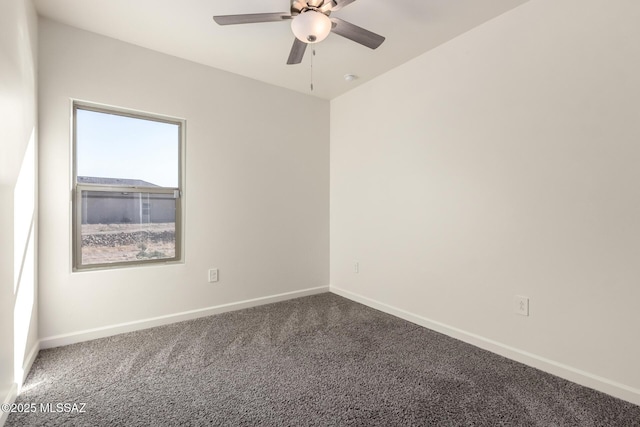 spare room featuring carpet flooring and ceiling fan