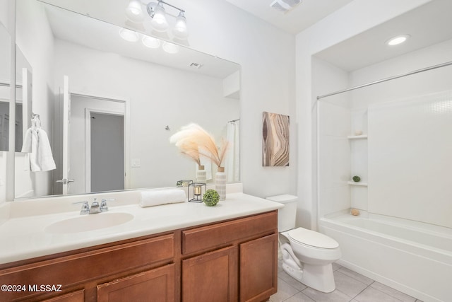 full bathroom with bathtub / shower combination, vanity, toilet, and tile patterned flooring