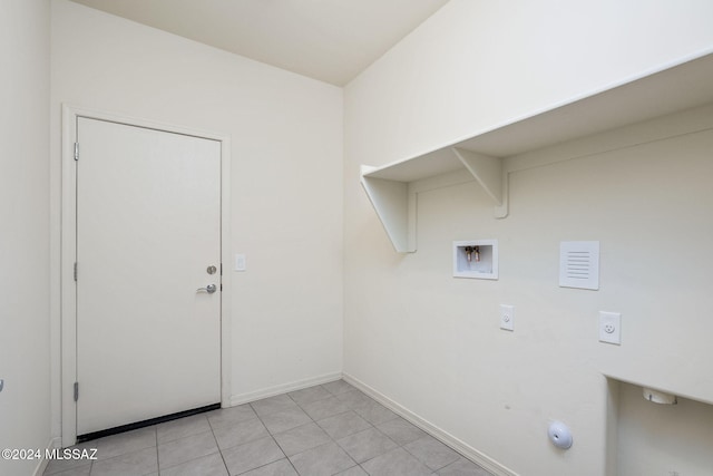 laundry room with washer hookup, hookup for an electric dryer, and light tile patterned floors