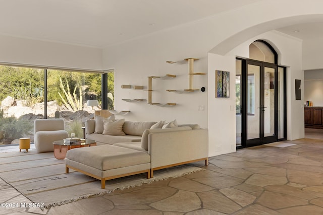 living room featuring crown molding