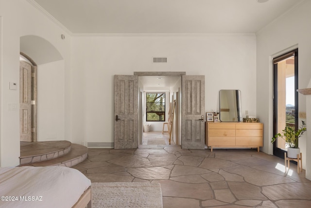 interior space featuring crown molding