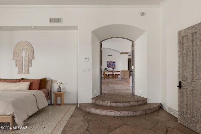 bedroom featuring ornamental molding