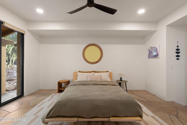 bedroom featuring ceiling fan and access to outside