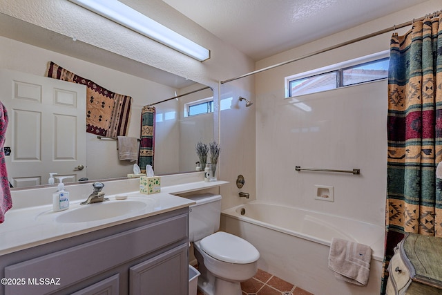 full bathroom with vanity, tile patterned flooring, toilet, and shower / bath combo with shower curtain