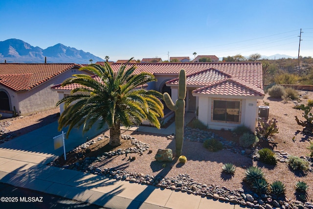 mediterranean / spanish-style home featuring a mountain view