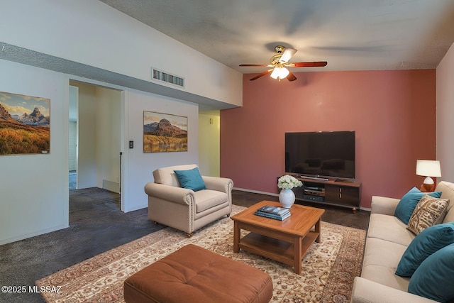 carpeted living room featuring ceiling fan