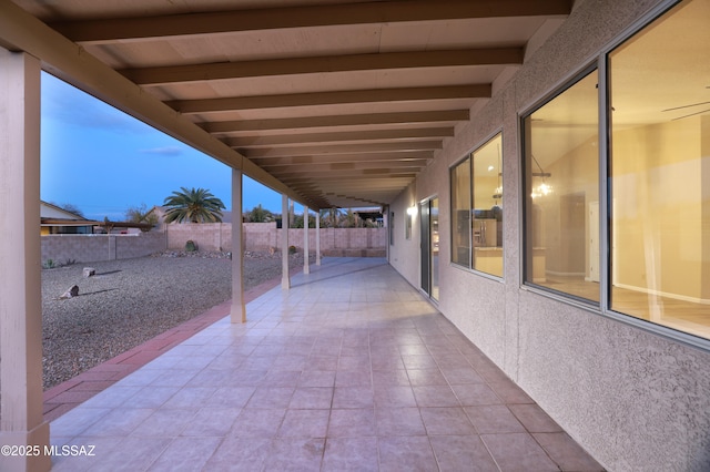 view of patio terrace at dusk