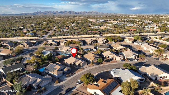 aerial view featuring a mountain view and a residential view