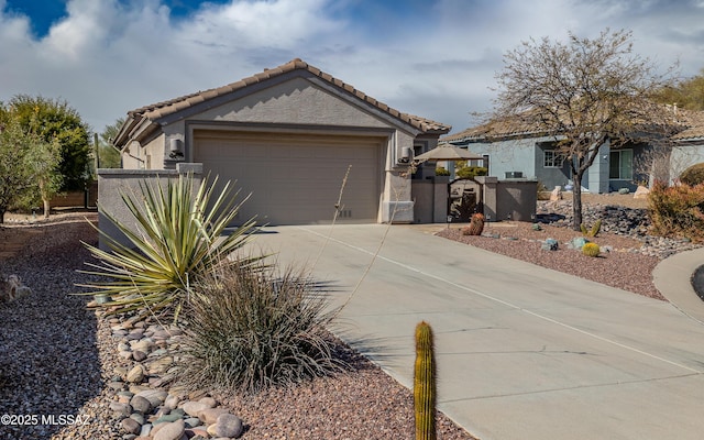 view of front of property with a garage