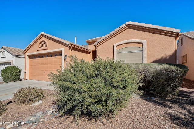 ranch-style home with a garage