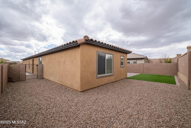 back of house with a patio area