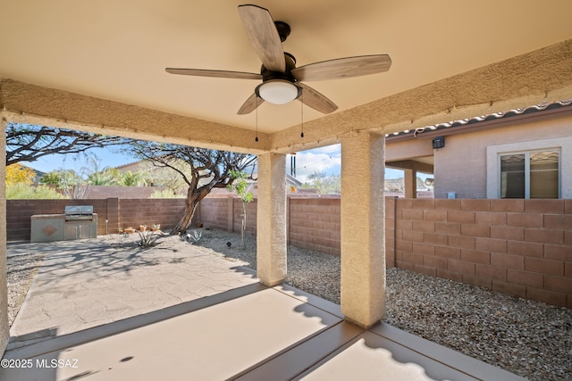 7715 E Fair Meadows Loop, Tucson, AZ 85756 - fenced backyard with a patio, a ceiling fan, and area for grilling