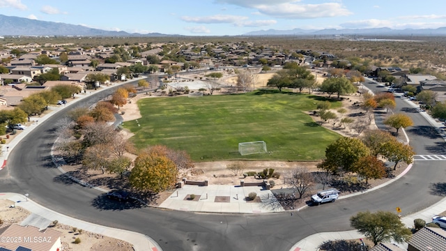 7715 E Fair Meadows Loop, Tucson, AZ 85756 - aerial view of residential area with mountains