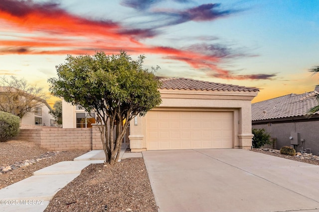 view of front of home with a garage