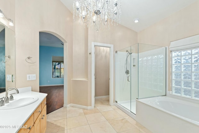 bathroom featuring vanity, tile patterned floors, and independent shower and bath