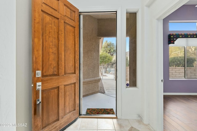 foyer with light tile patterned flooring