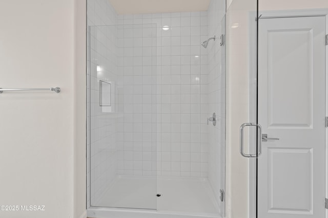 bathroom featuring an enclosed shower