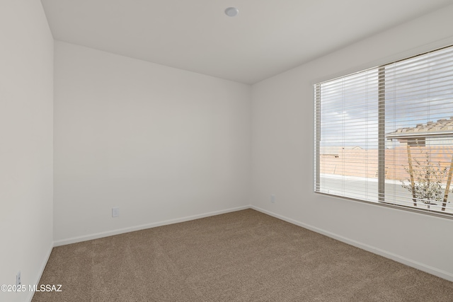 view of carpeted spare room