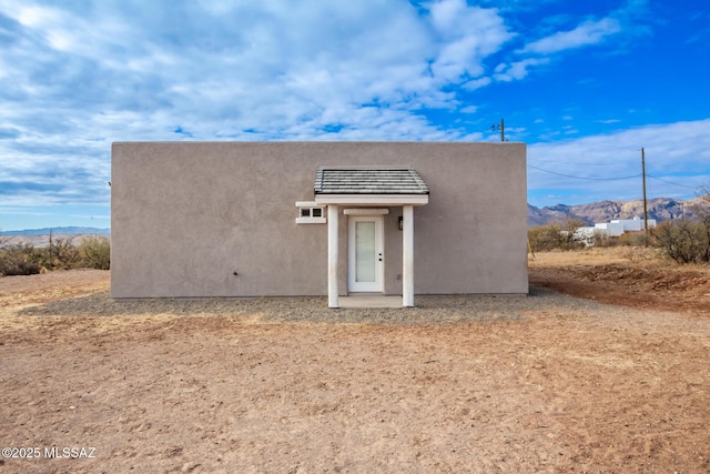 exterior space featuring a mountain view