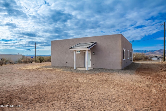 exterior space with a mountain view