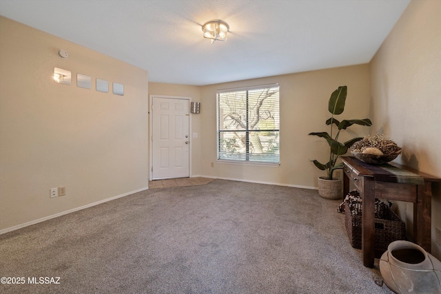 empty room with carpet flooring