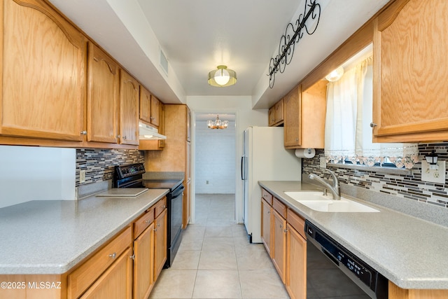 kitchen with light tile patterned flooring, sink, decorative backsplash, and black appliances