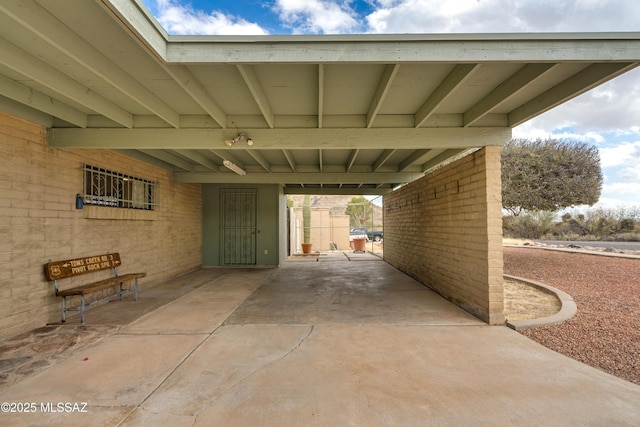 view of patio featuring a carport