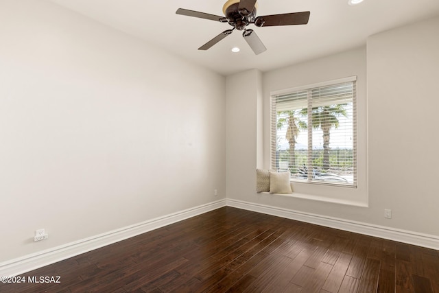 empty room featuring ceiling fan and wood-type flooring