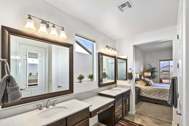 bathroom with a healthy amount of sunlight and vanity