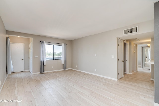 empty room featuring light hardwood / wood-style flooring