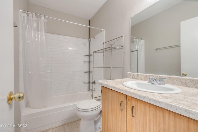 full bathroom featuring shower / bathtub combination with curtain, vanity, and toilet