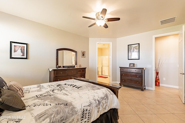 bedroom featuring ceiling fan, connected bathroom, and light tile patterned floors