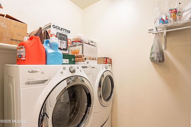 washroom featuring separate washer and dryer