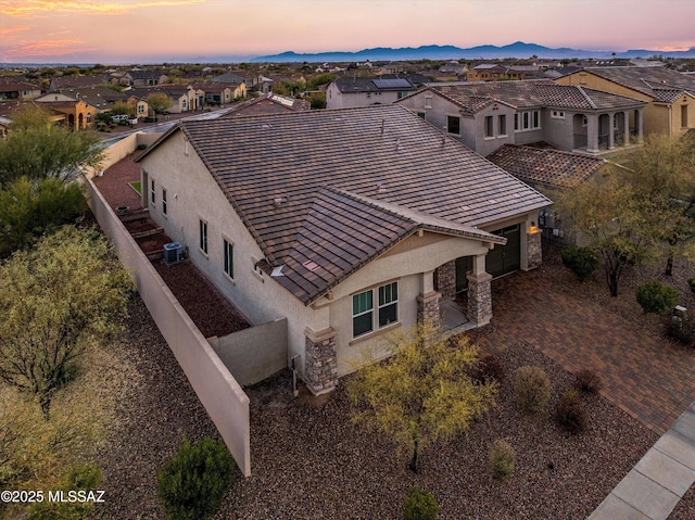 birds eye view of property featuring a residential view and a mountain view