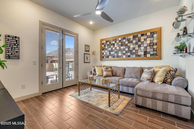 living area with ceiling fan, recessed lighting, wood finish floors, baseboards, and french doors