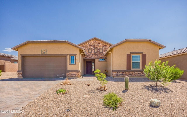 view of front of property with a garage