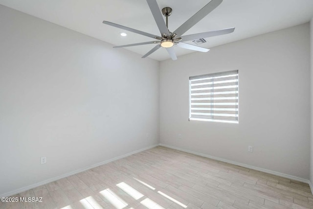 unfurnished room with light hardwood / wood-style flooring and ceiling fan