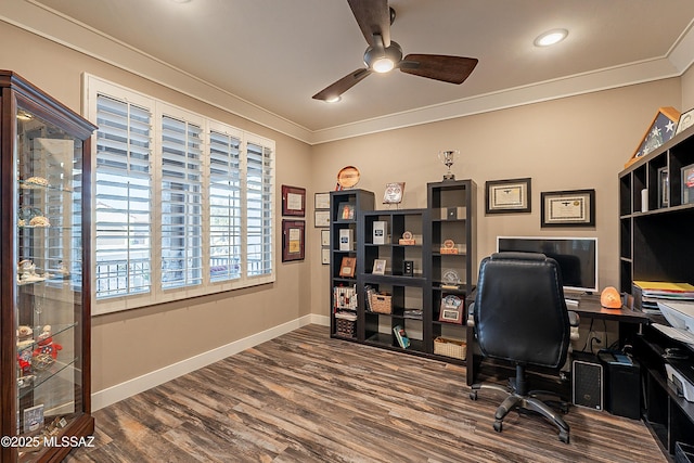 home office featuring hardwood / wood-style flooring, ornamental molding, and ceiling fan